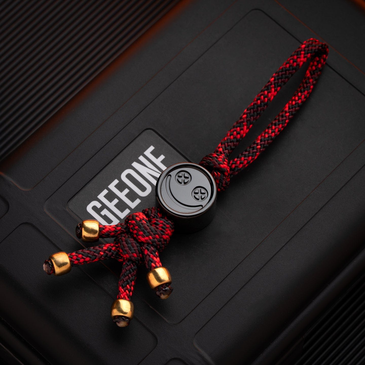 EDC Lanyard Bead – Bad Guy Smile | Titanium Zirconium Damascus Mokuti Super Conductor