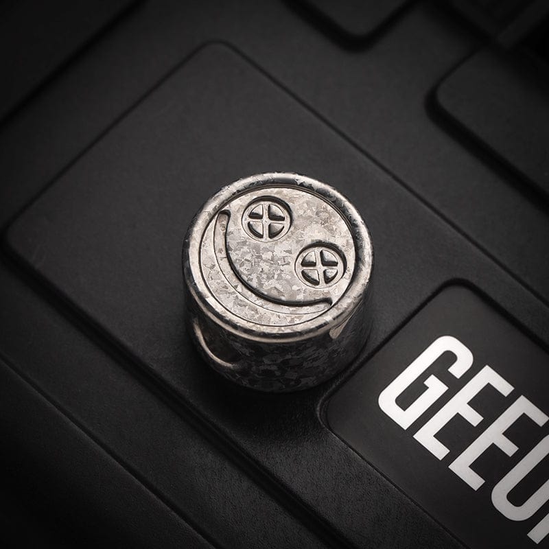 EDC Lanyard Bead – Bad Guy Smile | Titanium Zirconium Damascus Mokuti Super Conductor
