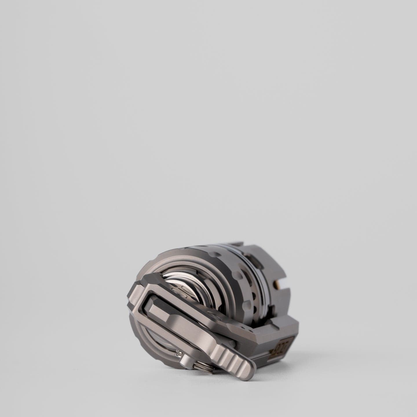 Tactile Slider – DJG Destroyer | Titanium Brass Zirconium EDC Push Slider