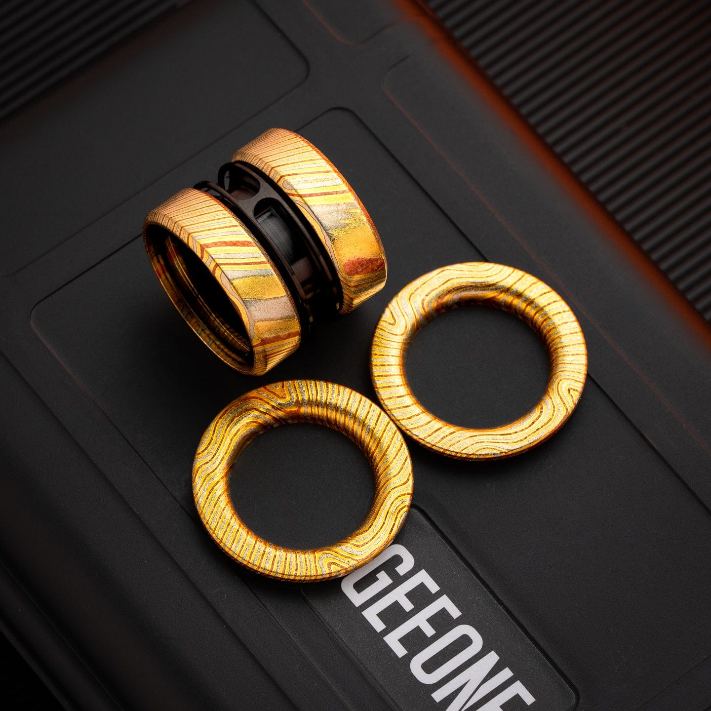Fidget Slider EDC – GoBiggeR Sinian | Titanium Zirconium Gold Steel Premium Push Slider